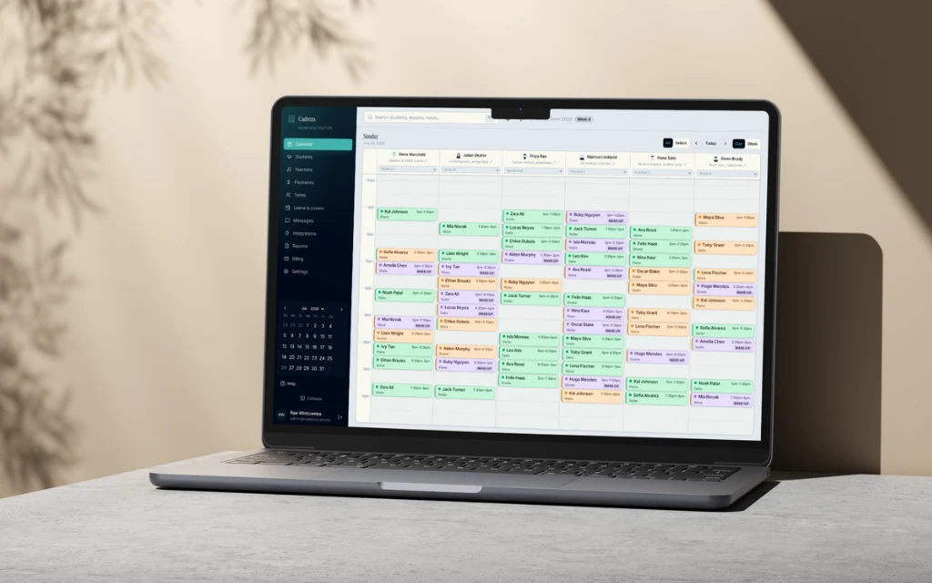 The Cadenza administrator calendar showing a day of appointments across several staff columns